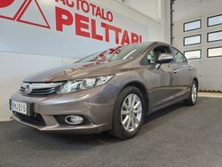 Ruskea (beige) Käytetty 2012 Honda Civic Executive Sedan | 12 500 € (Perustarjous)