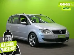 Hopea / harmaa Käytetty 2010 VW Touran Freestyle Tila-auto | 3 200 €