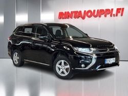 Musta Käytetty 2015 Mitsubishi Outlander P-HEV Intense+ Farmari | 12 400 € (Perustarjous)