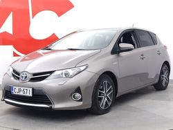 Ruskea (beige) Käytetty 2015 Toyota Auris Hybrid Active Viistoperä | 12 990 € (Perustarjous)