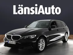 Musta Käytetty 2022 BMW 320e Farmari | 24 490 € (Hyvä tarjous)