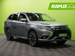 Hopea / harmaa Käytetty 2015 Mitsubishi Outlander P-HEV Instyle Sedan | 13 880 € (Hieman kallis)