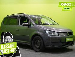 Hopea / harmaa Käytetty 2011 VW Touran Comfortline Tila-auto | 2 000 € (Perustarjous)