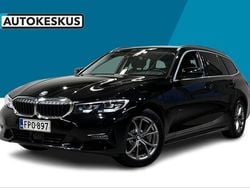 Musta Käytetty 2021 BMW 330e Sport Line Farmari | 24 990 € (Perustarjous)