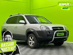 Hopea / harmaa Käytetty 2005 Hyundai Tucson GLS Katumaasturi | 3 500 €