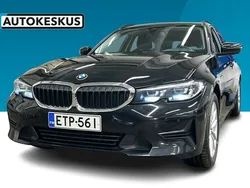 Musta Käytetty 2021 BMW 320e Farmari | 26 900 € (Perustarjous)