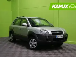 Hopea / harmaa Käytetty 2005 Hyundai Tucson GLS Katumaasturi | 3 300 €