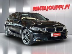 Musta Käytetty 2021 BMW 330e Sport Line Farmari | 24 800 € (Perustarjous)