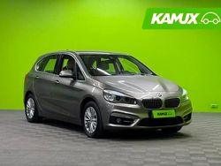 Hopea / harmaa Käytetty 2015 BMW 218 Active Tourer Luxury Line Tila-auto | 11 980 €