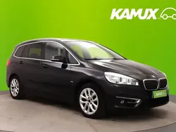 Musta Käytetty 2016 BMW 218 Active Tourer Luxury Line Tila-auto | 11 450 €