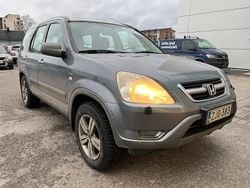 Harmaa Käytetty 2004 Honda CR-V ES Katumaasturi | 5 800 € (Hyvä tarjous)