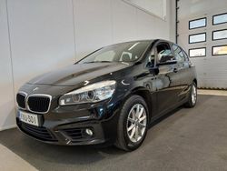 Musta Käytetty 2015 BMW 218 Active Tourer Comfort Edition Tila-auto | 12 500 €