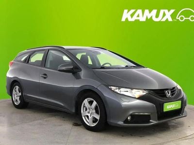 Käytetty Honda Civic Executive 120 HP (88 kW) 2014 Hopea / harmaa Tila-auto