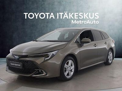 Ruskea (beige) Käytetty 2023 Toyota Corolla Edition Farmari | 28 690 € (Perustarjous)