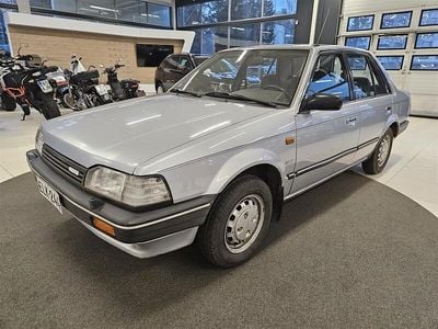Harmaa Käytetty 1989 Mazda 323 Sedan | 3 990 €