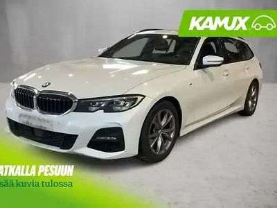 Valkoinen Käytetty 2021 BMW 320 M Sport Farmari | 28 900 € (Hieman kallis)