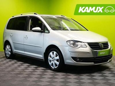 Käytetty VW Touran Trendline 140 HP (102 kW) 2009 Hopea / harmaa Tila-auto