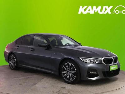 Hopea / harmaa Käytetty 2021 BMW 320e M Sport Sedan | 34 790 € (Hieman kallis)