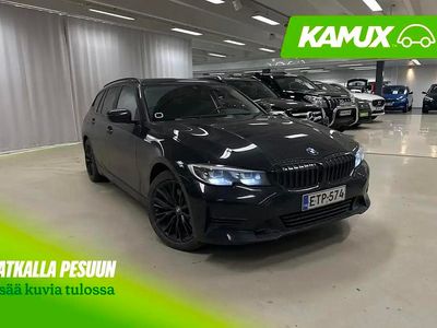 Musta Käytetty 2021 BMW 320e Farmari | 24 900 €