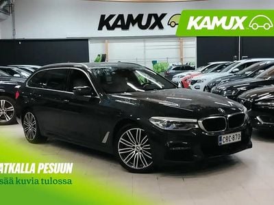Hopea / harmaa Käytetty 2019 BMW 520 M Sport Farmari | 21 700 € (Hieman kallis)