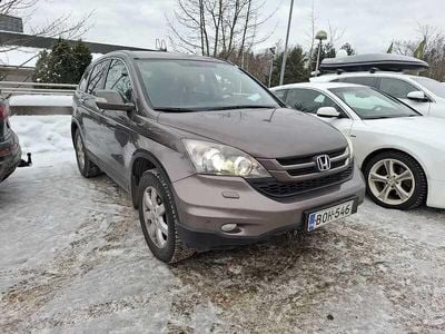 Käytetty Honda CR-V Elegance 150 HP (110 kW) 2010 Ruskea Katumaasturi
