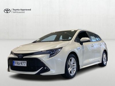 käytetty Toyota Corolla Touring Sports 1,8 Hybrid Active - *Korko alk. 2,99% + kulut* - *2xrenkaat*Navi*Upea helmiäisvalkoiinen*