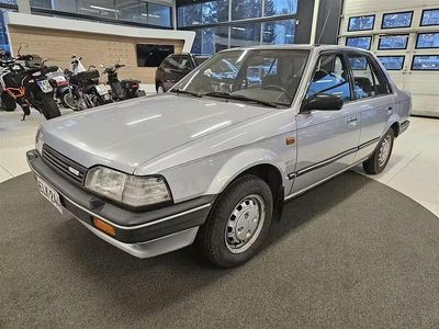 Käytetty Mazda 323 1989 Harmaa Sedan
