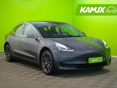 Hopea / harmaa Käytetty 2019 Tesla Model 3 Standard Range Sedan | 14 990 € (Hieman kallis)