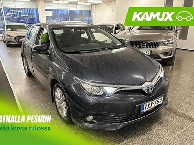 Hopea / harmaa Käytetty 2015 Toyota Auris Hybrid Active Sedan | 12 680 € (Perustarjous)