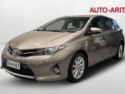 Käytetty Toyota Auris Hybrid Comfort 99 HP (72 kW) 2015 Ruskea Viistoperä
