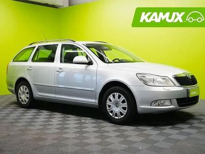 Käytetty Skoda Octavia Ambiente 105 HP (77 kW) 2012 Hopea / harmaa Farmari