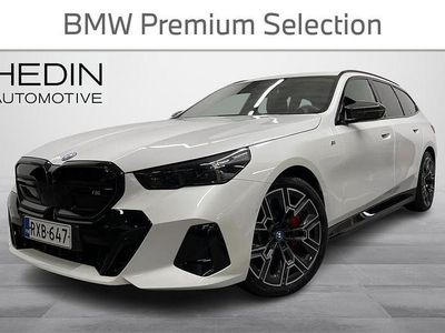 Valkoinen Käytetty 2025 BMW i5 M Sport Farmari | 92 900 € (Kallis)
