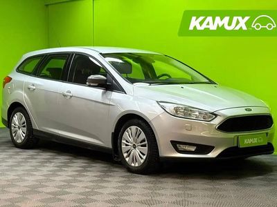 Käytetty Ford Focus Trend 101 HP (74 kW) 2016 Hopea / harmaa Farmari