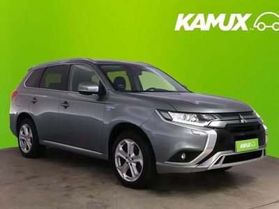 Käytetty Mitsubishi Outlander P-HEV Intense 135 HP (99 kW) 2021 Hopea / harmaa Katumaasturi