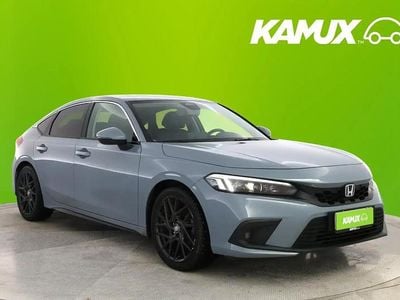 Hopea / harmaa Käytetty 2023 Honda Civic Advance Sedan | 27 490 €