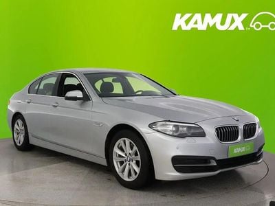 Käytetty BMW 518 150 HP (110 kW) 2015 Hopea / harmaa Sedan