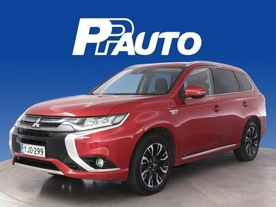 Käytetty Mitsubishi Outlander P-HEV Intense+ 121 HP (88 kW) 2017 Punainen Farmari