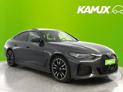Hopea / harmaa Käytetty 2022 BMW i4 Comfort Edition Sedan | 48 980 € (Perustarjous)