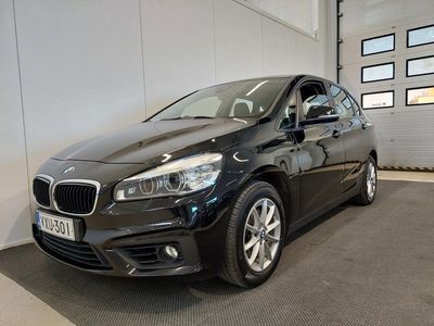 Musta Käytetty 2015 BMW 218 Active Tourer Comfort Edition Tila-auto | 12 500 €