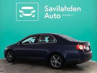 Käytetty VW Touran 143 HP (105 kW) 2006 Harmaa Tila-auto