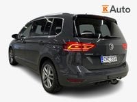 Käytetty VW Touran Highline 150 HP (110 kW) 2019 Harmaa Tila-auto