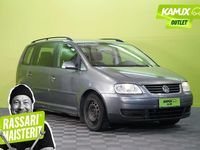 Käytetty VW Touran Trendline 116 HP (85 kW) 2004 Hopea / harmaa Tila-auto