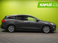 Käytetty Ford Focus Titanium 125 HP (91 kW) 2019 Hopea / harmaa Farmari