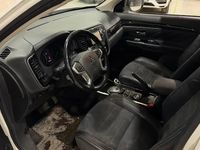 Käytetty Mitsubishi Outlander P-HEV Intense 150 HP (110 kW) 2016 Valkoinen Farmari