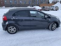 Käytetty Kia Rio LX 84 HP (61 kW) 2015 Harmaa Viistoperä