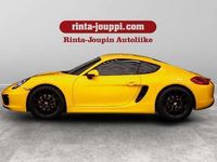 käytetty Porsche Cayman PDK 2,7 - Racing Yellow ulkoväri + vyöt / Sport Chrono + / Sound package + / Sportdesign ratti / PAS