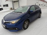 Käytetty Toyota Auris Hybrid Active 99 HP (72 kW) 2016 Sininen Viistoperä