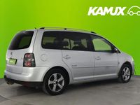 Käytetty VW Touran Freestyle 105 HP (77 kW) 2009 Hopea / harmaa Tila-auto