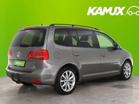 Käytetty VW Touran Comfortline 105 HP (77 kW) 2011 Hopea / harmaa Tila-auto