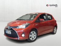Käytetty Toyota Yaris Hybrid Active 75 HP (55 kW) 2014 Punainen Viistoperä